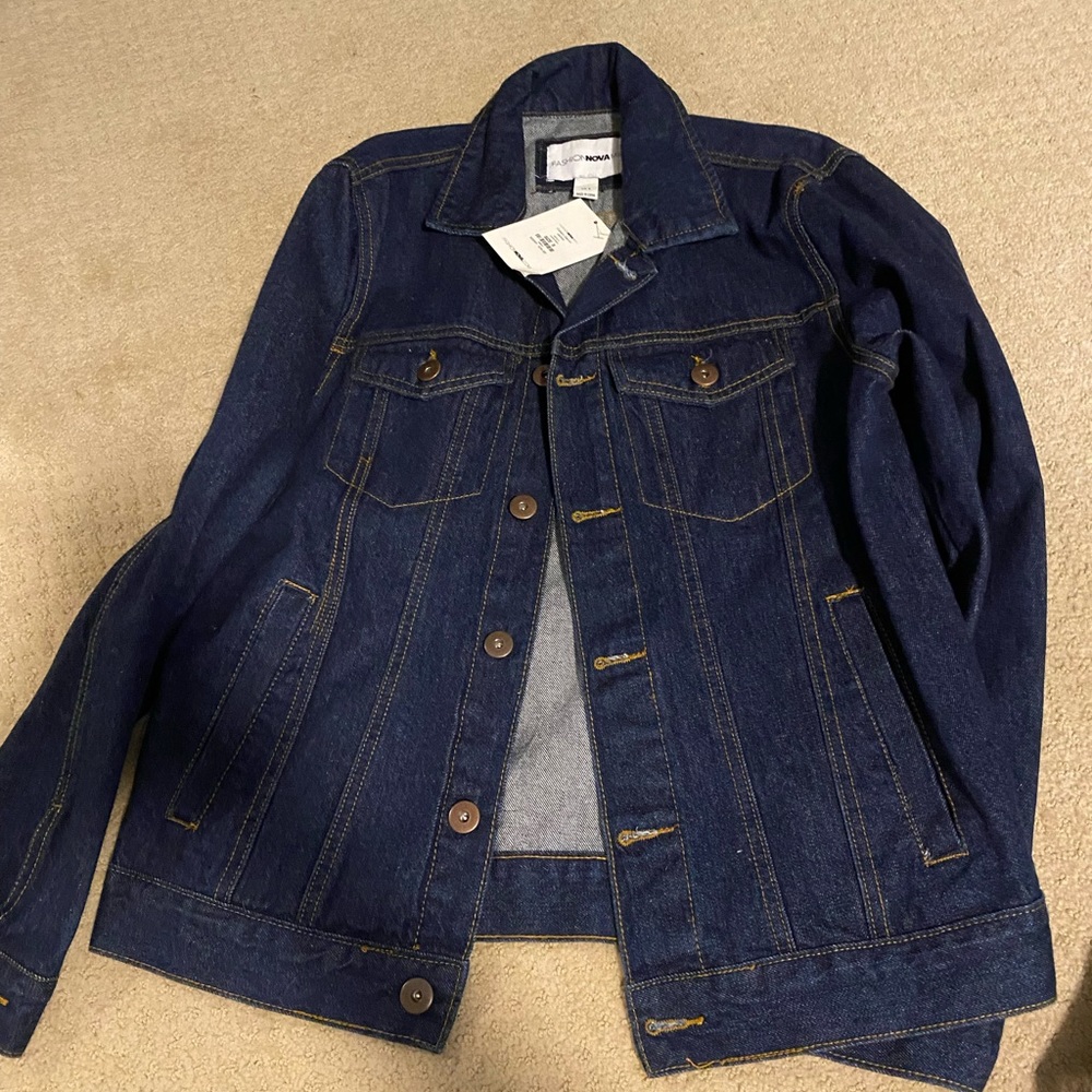 Brand new. Never worn. Men’s jean jacket.